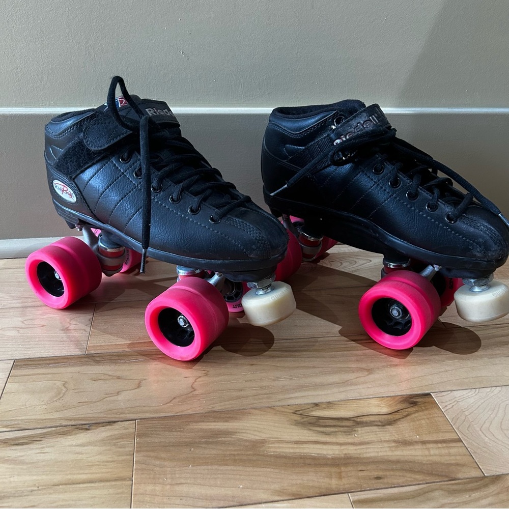 Riedell R3 Roller Skates with wrist guards and elbow pads